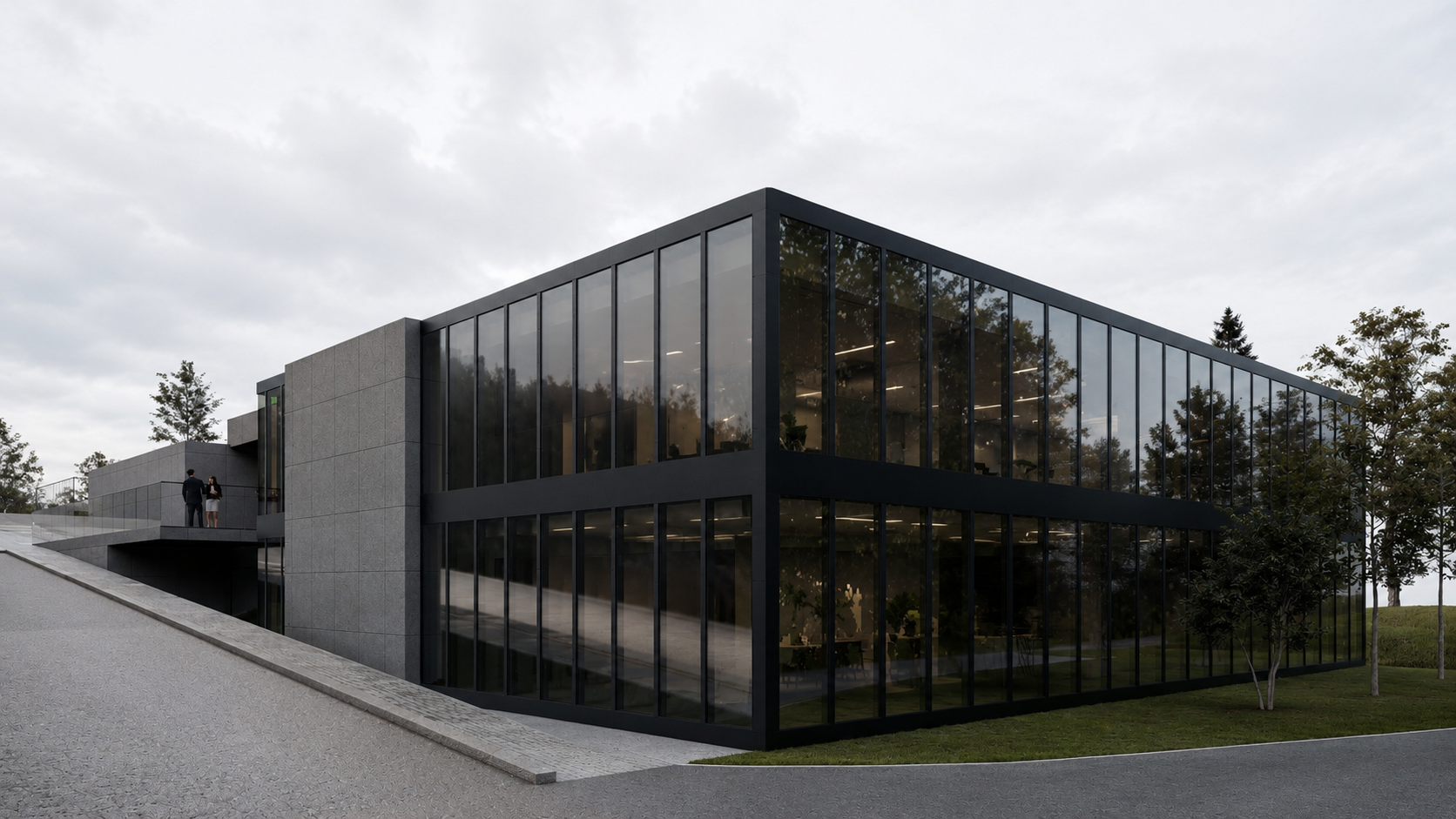 Exterior view — glazed office volume and site integration